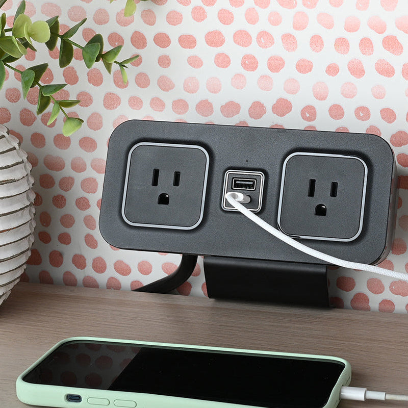 CubieDash hotel charging hub on a bracket with power outlets and usb ports