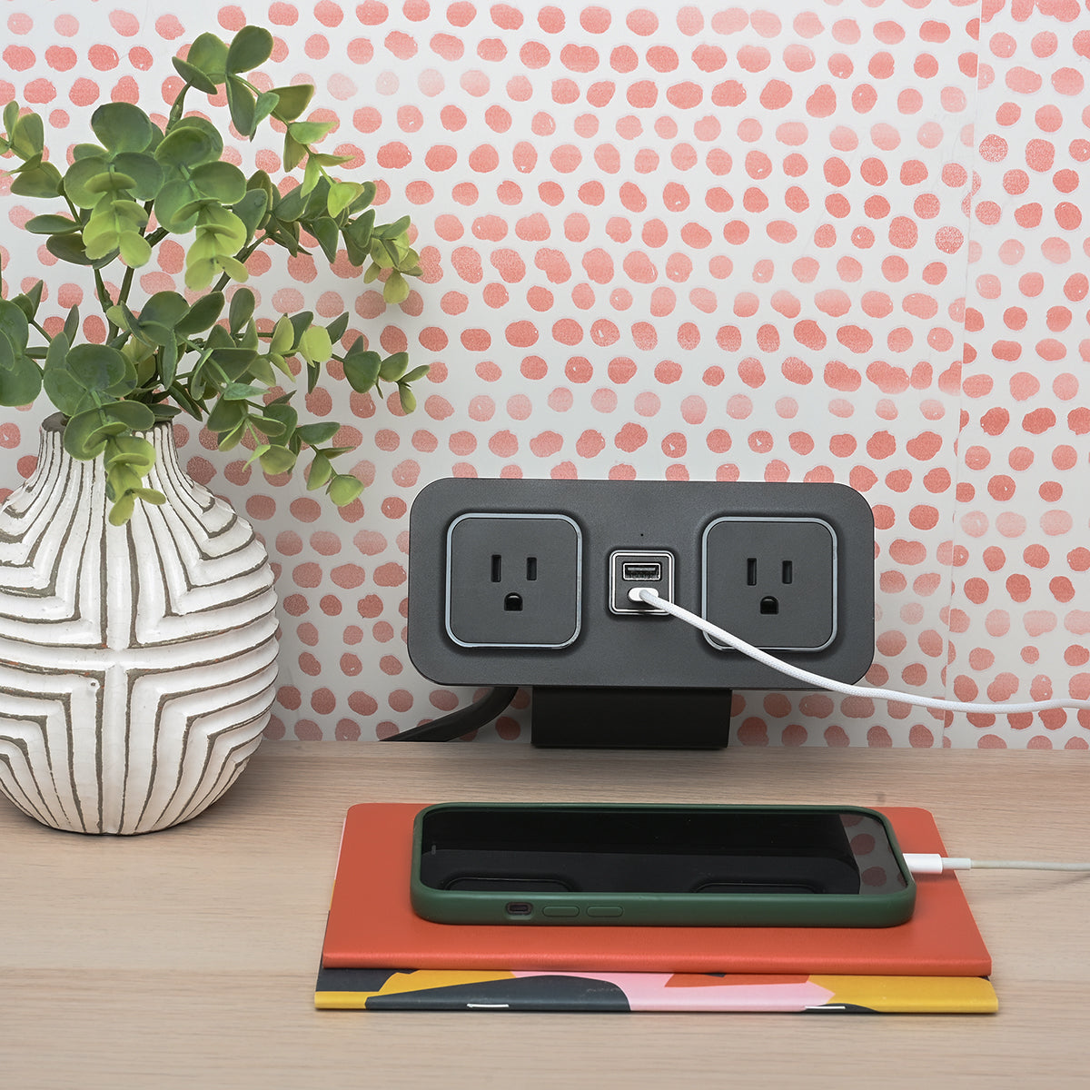 CubieDash hotel charging hub on a bracket with power outlets and usb ports