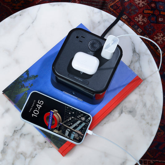 CubieTrio+ Hotel single day alarm clock with wireless charging, USB ports, power outlets and a bluetooth speaker