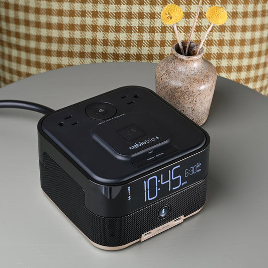 CubieTrio+ Hotel single day alarm clock with magnetic wireless charging, USB ports, power outlets and a bluetooth speaker