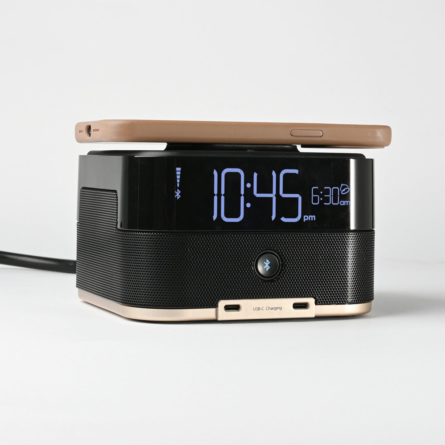 CubieTrio+ Hotel single day alarm clock with magnetic wireless charging, USB ports, power outlets and a bluetooth speaker
