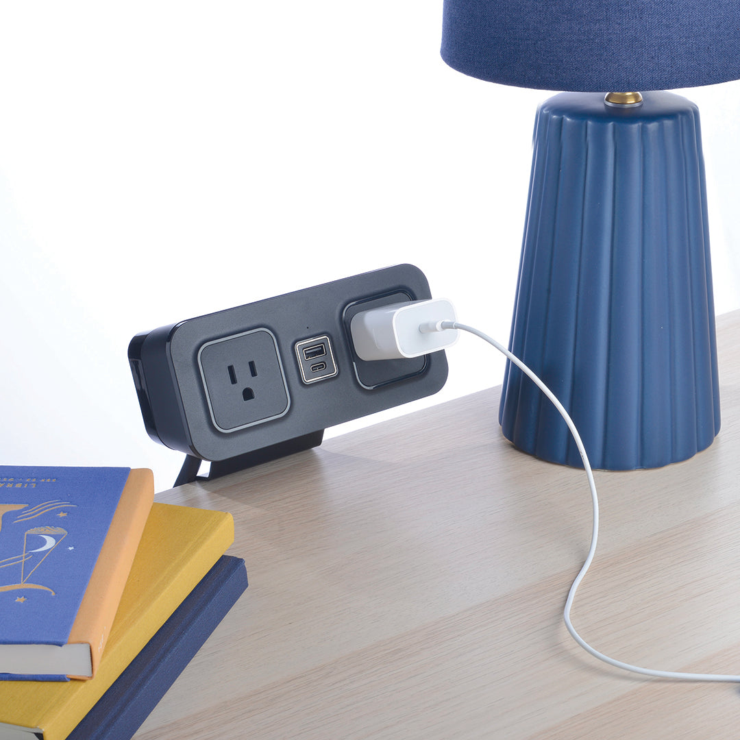 CubieDash hotel charging hub on a bracket with power outlets and usb ports