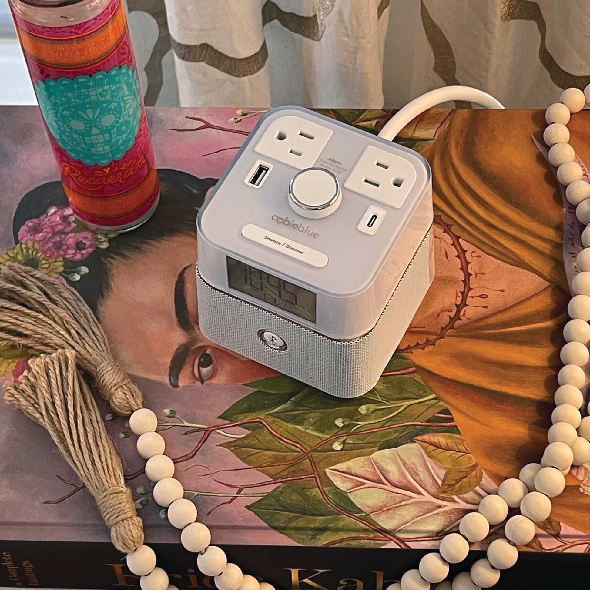 CubieBlue White Hotel single day alarm clock with USB ports, power outlets and a bluetooth speaker