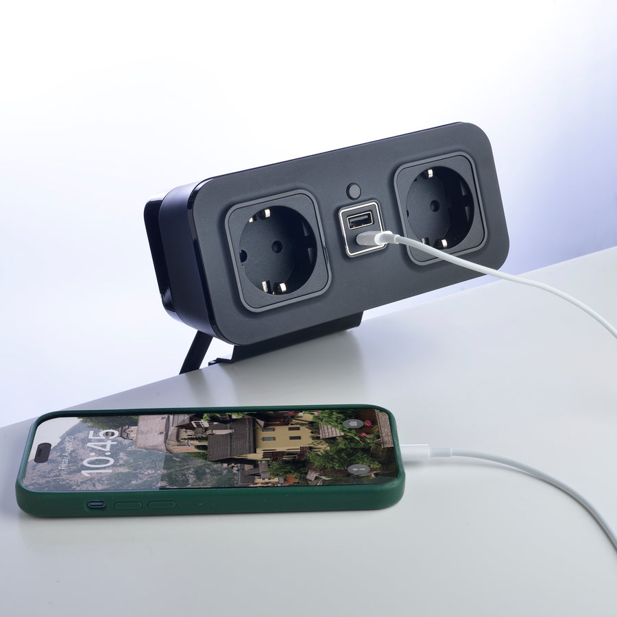 CubieDash hotel charging hub on a bracket with power outlets and usb ports