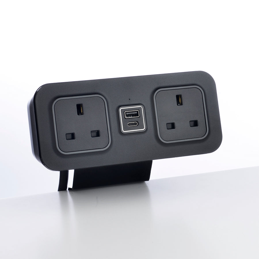 CubieDash hotel charging hub on a bracket with power outlets and usb ports