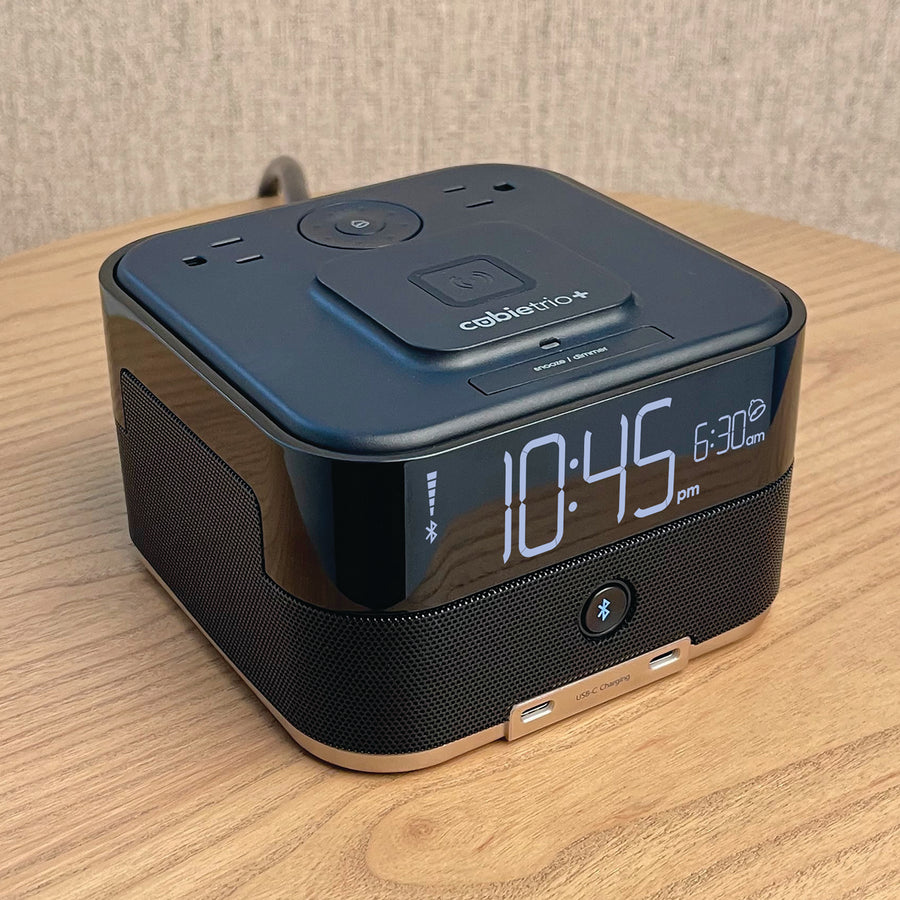 CubieTrio+ Hotel single day alarm clock with magnetic wireless charging, USB ports, power outlets and a bluetooth speaker
