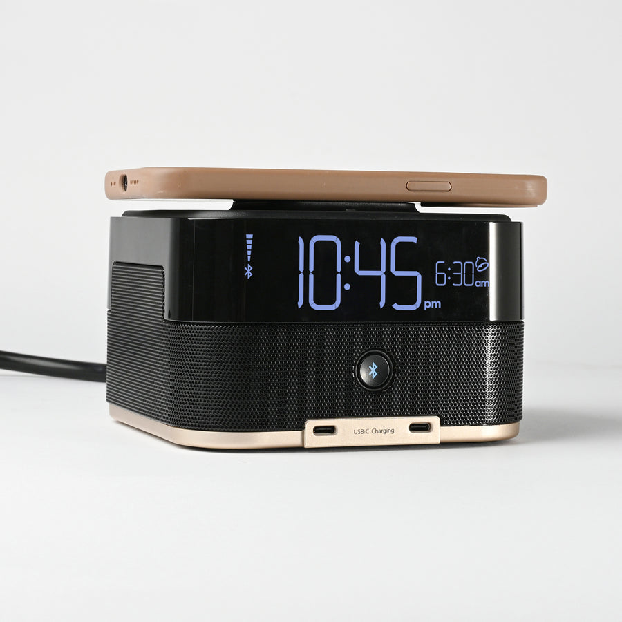 CubieTrio+ Hotel single day alarm clock with magnetic wireless charging, USB ports, power outlets and a bluetooth speaker